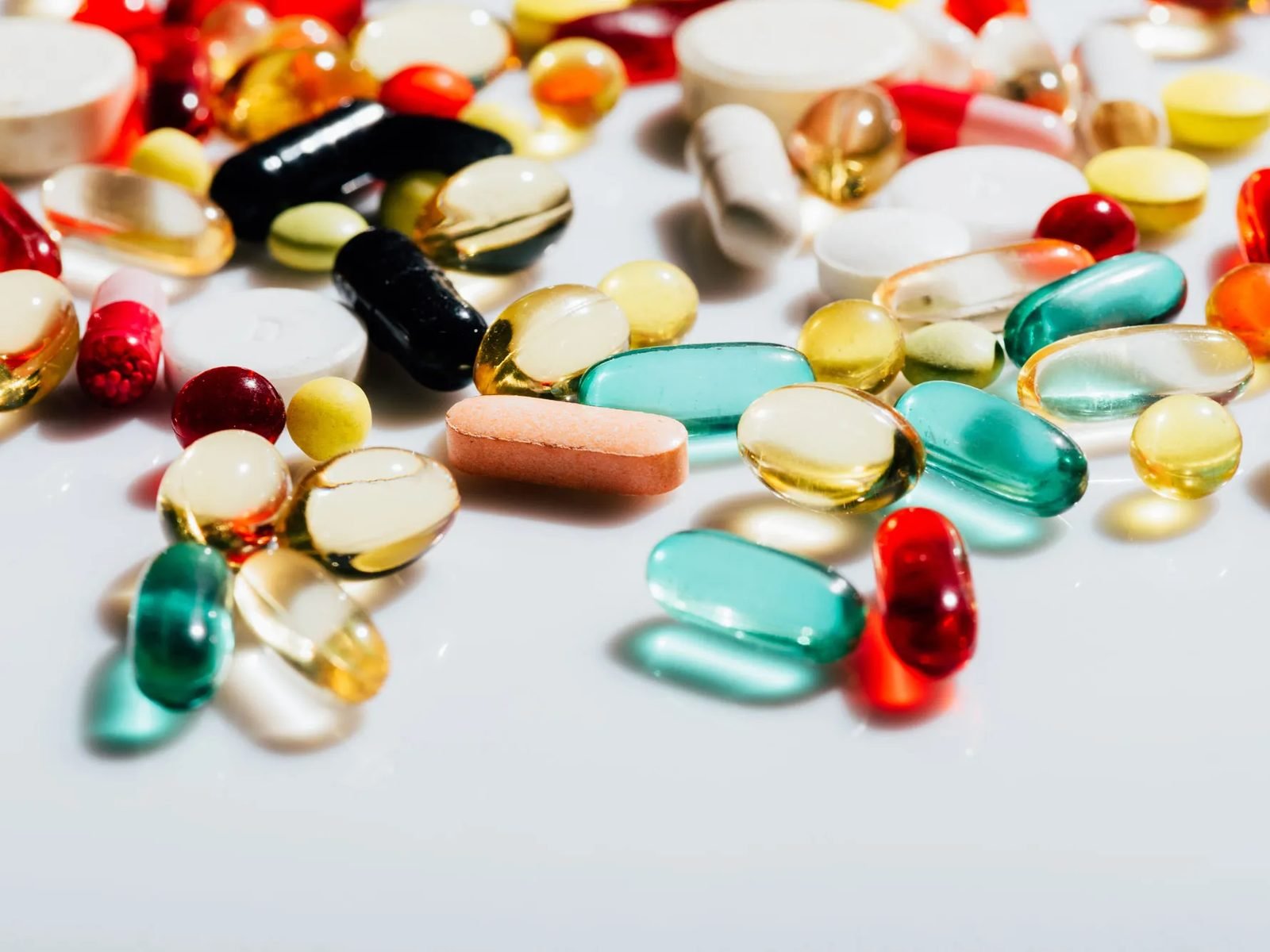 Supplement capsules and tablets in production.